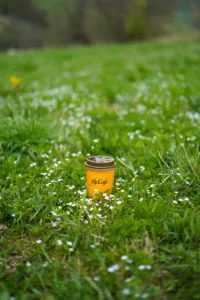 coffee cup in grass
